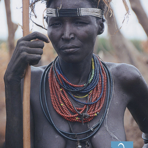 WomanGalebTribeHoldingStickthumb